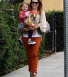 Actress Alyson Hannigan takes daughter Satyana after lunch with her dad to get a new toy in Beverly Hills, Ca on September 17, 2011.
