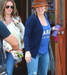 Hilary Duff made her way out of a Vet in Sherman Oaks, California on September 28, 2011 with her sister Haylie after picking up their small dog.