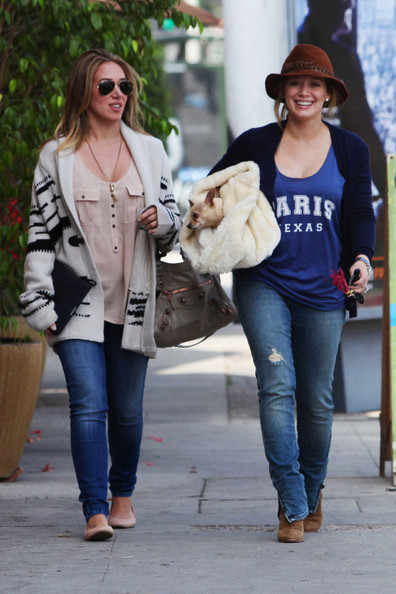 Hilary Duff made her way out of a Vet in Sherman Oaks, California on September 28, 2011 with her sister Haylie after picking up their small dog.