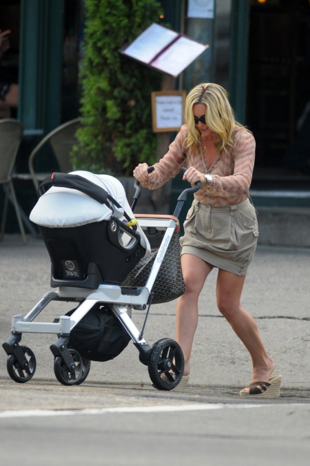 Jane Krakowski pushing around her baby boy Bennet Robert in a stroller around New York.
