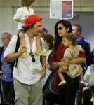 Matthew McConaughey and his wife Camila Alves arrive at LAX with their children Levi and Vida