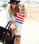 Nicole Richie hits the beach in Malibu, CA on September 3, 2011 with daughter Harlow Madden