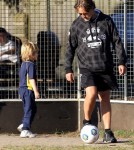 Russell Crowe kicks a soccer ball around with youngest son Tennyson