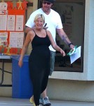 Pregnant Tori Spelling looks about to pop as she goes out with husband Dean McDermott in Los Angeles, CA on September 27, 2011