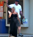 Pregnant Tori Spelling looks about to pop as she goes out with husband Dean McDermott in Los Angeles, CA on September 27, 2011