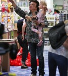 Paul Stanley, founder and front man of Kiss, took wife Erin Sutton and daughter Sarah Brianna to a toy store in Los Angeles, California on October 18, 2011.