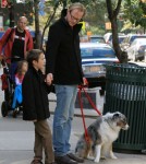 Paul Bettany and his son Stellan made their way home with the family dog in New York City, New York on October 23, 2011.