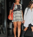 Beyonce shows off her growing belly as she leaves the Gansevoort hotel in NYC.