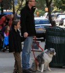 Paul Bettany and his son Stellan made their way home with the family dog in New York City, New York on October 23, 2011.