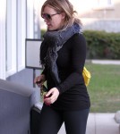 Hilary Duff made her way to a Pilates class in Los Angeles, California on October 26, 2011 wearing an all black tight outfit which showed off her growing baby bump.