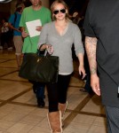 Hilary Duff Arrives at Lax With A New BUMP!
