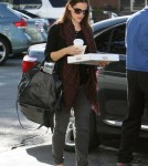 Pregnant actress Jennifer Garner shows off he baby bump while out for Starbucks, Kispy Kreme and a quick visit to the doctor in Los Angeles, California on October 3, 2011.