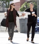 Pregnant actress Jennifer Garner shows off he baby bump while out for Starbucks, Kispy Kreme and a quick visit to the doctor in Los Angeles, California on October 3, 2011.