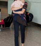 Miranda Kerr and Flynn touched down at Heathrow airport in London (October 5).