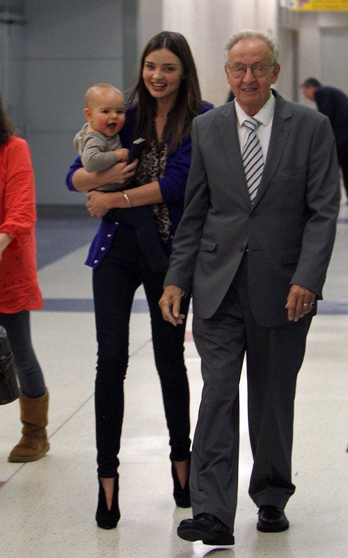 Miranda Kerr and Flynn arrive at JFK Airport in New York City on Sunday (October 16).