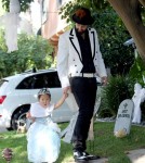 Katherine Heigl wears a witch costume as she and her husband Josh Kelley dress their adorable daughter Naleigh in a princess costume for a Halloween party.