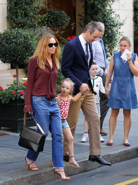 Stella McCartney leaves her fashion show with her husband Alasdhair Willis, daughter Bailey Willis and son Miller Willis during Fashion Week in Paris, France on October 3, 2011.