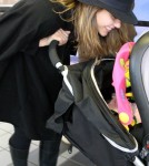 Jessica Alba was chic in all black as she arrived at the airport with her new daughter Haven in Los Angeles, California on November 5th, 2011.