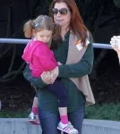 Alyson Hannigan enjoyed at day at The Skirball Cultural Center with her husband Alexis Denisof, their young daughter Satyana and her grandparents on November 22, 2011 in Los Angeles, California.