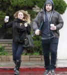 Pregnant Hilary Duff and Mike Comrie enjoy a rainy weather in Beverly Hills, California on November 20