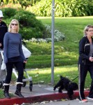 January Jones and her father Marvin spend a bit of time together as they take Jones' son Xander for a walk around the neighborhood.