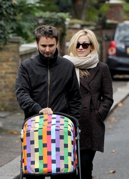 Kate Hudson and Matthew Bellamy wrap up warm as they stroll with their baby son, Bingham Hawn Bellamy, in London.