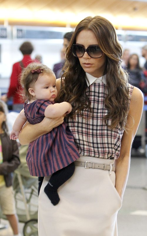 Victoria and Harper at LAX Airport in Los Angeles, California on Saturday afternoon (November 26).