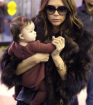 Victoria Beckham and baby Harper are see at JFK Airport to catch a plane to Los Angeles.