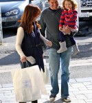 Alyson Hannigan and husband Alexis Denisof and their daughter Satyana went shopping in Brentwood, ca on December 4, 2011