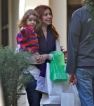 Alyson Hannigan and husband Alexis Denisof and their daughter Satyana went shopping in Brentwood, ca on December 4, 2011