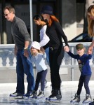Marcia Cross and her husband Tom Mahoney take their daughters Eden and Savannah ice skating in Santa Monica.