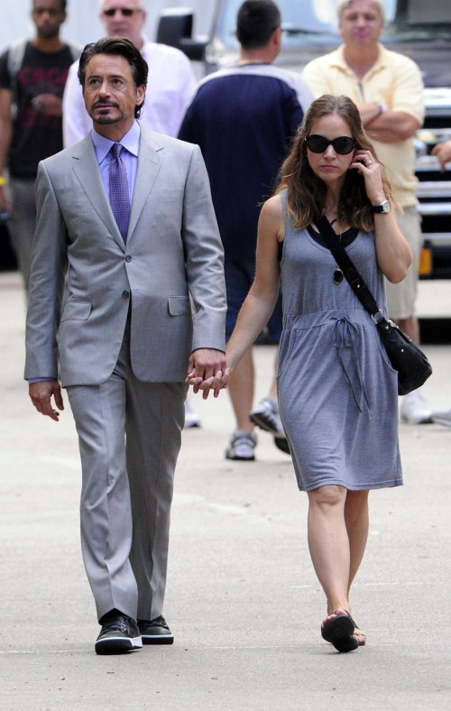 Robert Downey, Jr. holds hands with pregnant wife Susan Levin Downey as they walk to the set of "The Avengers" in Central Park, NYC 09-02-2011