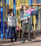 BABY BUMP ALERT! Alyson Hannigan, who is currently pregnant with her second child, takes her daughter Satyana to play at the park with husband Alexis Denisof