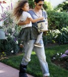 Superstar Halle Berry is spotted wearing a black cast on her leg while picking up her daughter Nahla from school