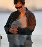 Keri Russell carries her newborn daughter Willa Lou in a baby carrier under her sweater as she heads to a carousel in Brooklyn with her family