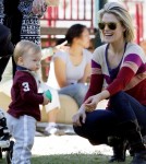 Ali Larter takes her adorable baby son Teddy to the park to play on the swings and in the sandbox 01-03-2012