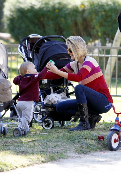 Ali Larter takes her adorable baby son Teddy to the park to play on the swings and in the sandbox 01-03-2012