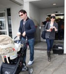 Elizabeth Banks and husband Max Handelman touch down at LAX in Los Angeles, CA with baby Felix Handelman on January 22, 2012