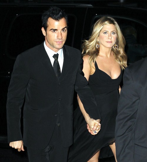 Jennifer Aniston and her beau Justin Theroux head to the Museum of Modern Art in New York for an after party.