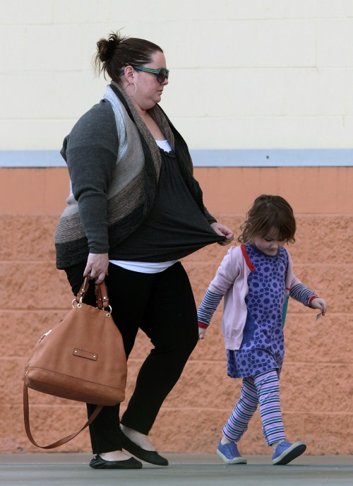Melissa McCarthy took her daughter Vivian Falcone shopping at Michaels Arts & Crafts in Burbank, California on January 30, 2012.