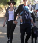 Orlando Bloom and his wife Miranda Kerr take their baby son Flynn for a hike in Runyon Canyon on his birthday.