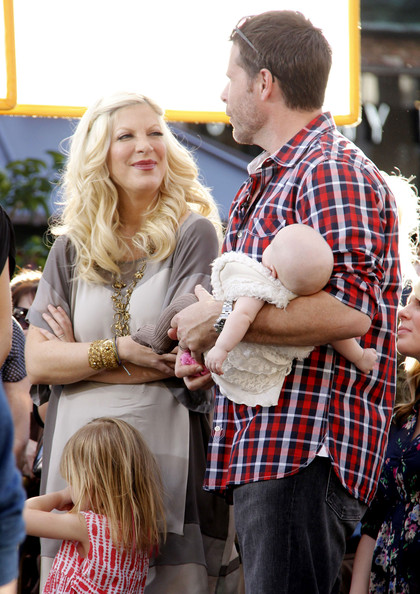 Tori Spelling and her family are interviewed on “Extra” at The Grove on January 25, 2012 in Los Angeles, CA.
