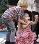 Tori Spelling and her family are interviewed on "Extra" at The Grove on January 25, 2012 in Los Angeles, CA.