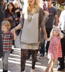 Tori Spelling and her family are interviewed on "Extra" at The Grove on January 25, 2012 in Los Angeles, CA.