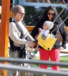 Pink and her daughter Willow Hart out shopping at 98% Angel and then getting on a swing set in Malibu, CA on February 18, 2012.