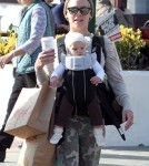 Pink and her daughter Willow Hart out shopping at 98% Angel and then getting on a swing set in Malibu, CA on February 18, 2012.