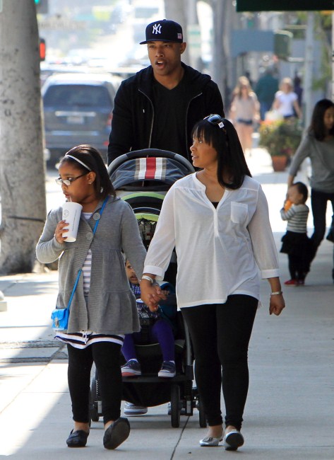 NBA player Caron Butler enjoyed a day out with his family in Beverly Hill, California on February 25, 2012. He took a stroll with his wife Andrean daughters Mia, Camary and son Caron Jr. after lunch at a local Chipotle Mexican Grill.