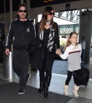 Christian Bale And Family Arriving For A Flight At LAX