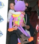 Model Gabriel Aubry picks up his daughter Nahla from school on February 8, 2012 in Los Angeles, CA. Nahla was barely visible behind the giant, purple stuffed animal she was carrying!