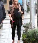Hilary Duff heads out into the rain after eating lunch at a restaurant on February 15, 2012 in Beverly Hills, CA.
